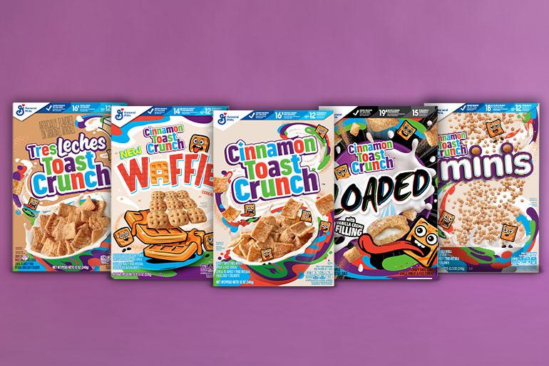 Agrupación dispuesta de cajas de cereales Cinnamon Toast Crunch sobre un fondo morado.